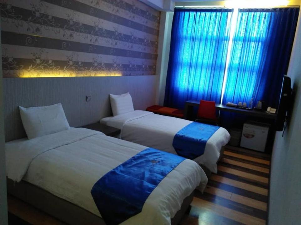 4Orty Inn Бінтулу Екстер'єр фото