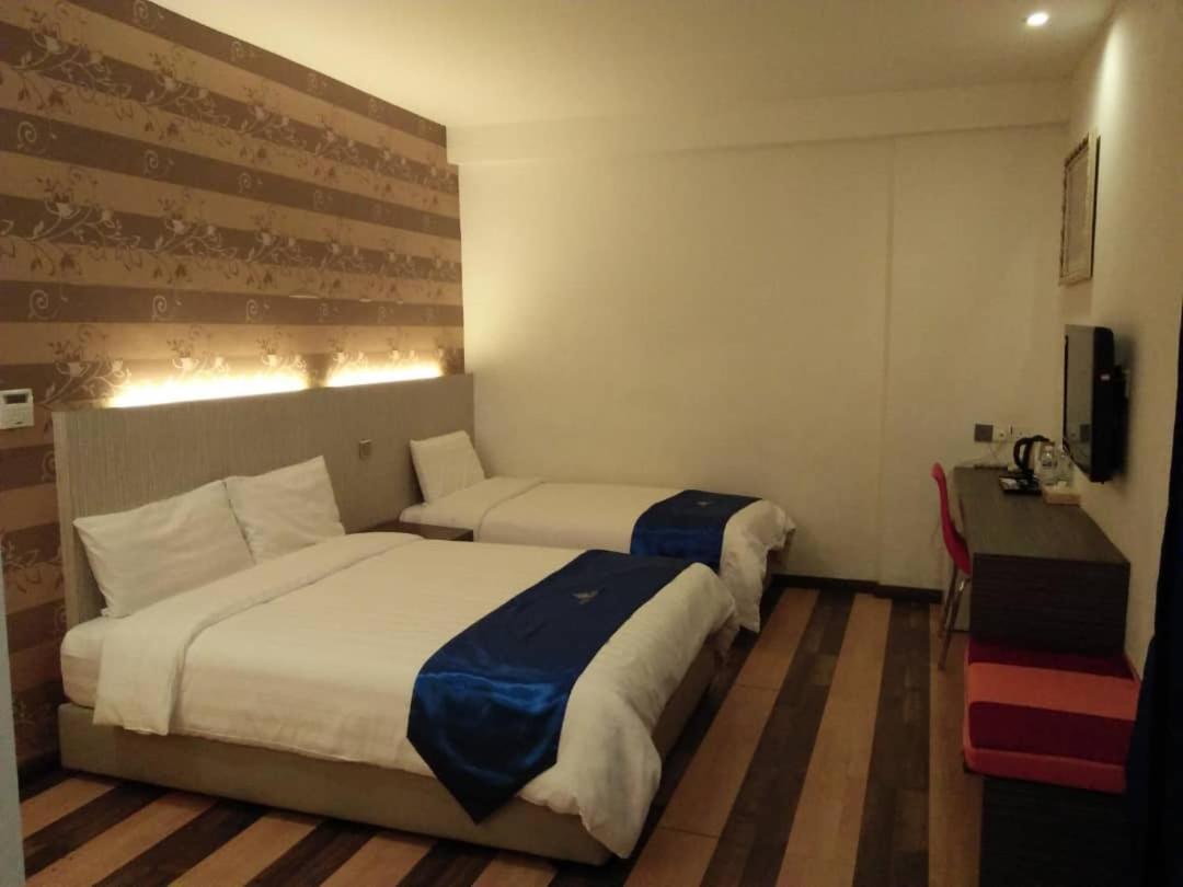 4Orty Inn Бінтулу Екстер'єр фото